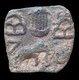 Sri Lanka: Coin of the Pandya period featuring a temple (above), and elephant (below), and hills to either side, 1st century CE